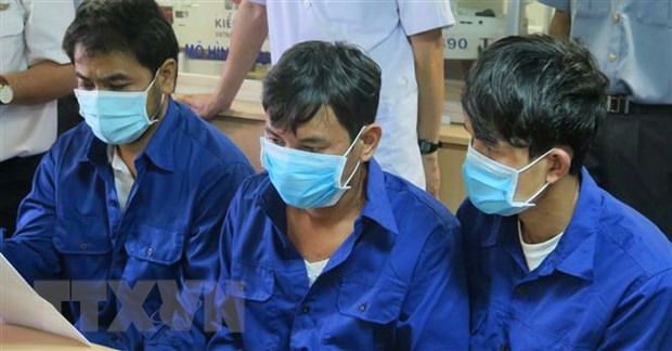 Ba ngư dân tàu cá BĐ 97469 TS: Huỳnh Xuân Phi, Võ Văn Hoài và Lê Minh Don đều trú tại huyện Hoài Nhơn, tỉnh Bình Định. (Ảnh: Phan Sáu/TTXVN)