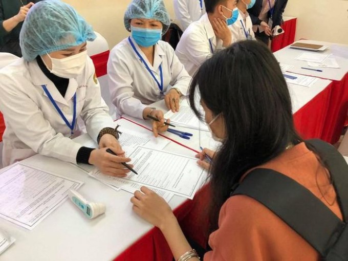 Nhiều người bày tỏ tin tưởng vào vắcxin COVID-19 'made in Vietnam.' (Ảnh: PV/Vietnam+)