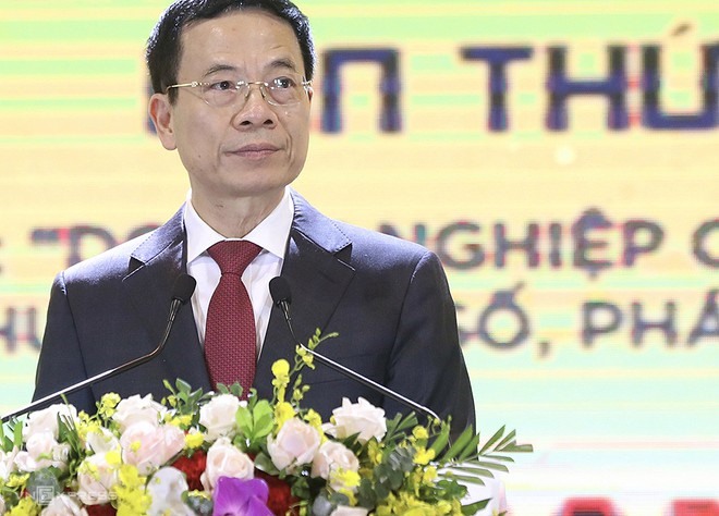 Bộ trưởng Nguyễn Mạnh Hùng phát biểu khai mạc diễn đàn. ẢNH VNE