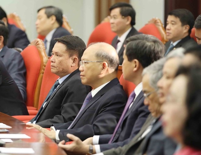 Các đại biểu biểu quyết thông qua chương trình hội nghị. (Ảnh: Phương Hoa/TTXVN)