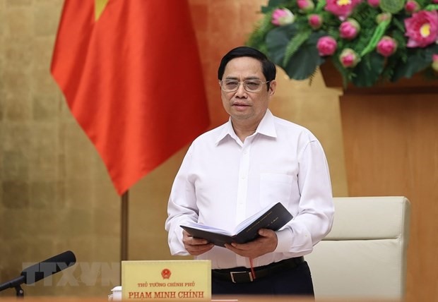 Thủ tướng Phạm Minh Chính chủ trì làm việc trực tuyến với lãnh đạo chủ chốt tỉnh Thừa Thiên-Huế. (Ảnh: Dương Giang/TTXVN)