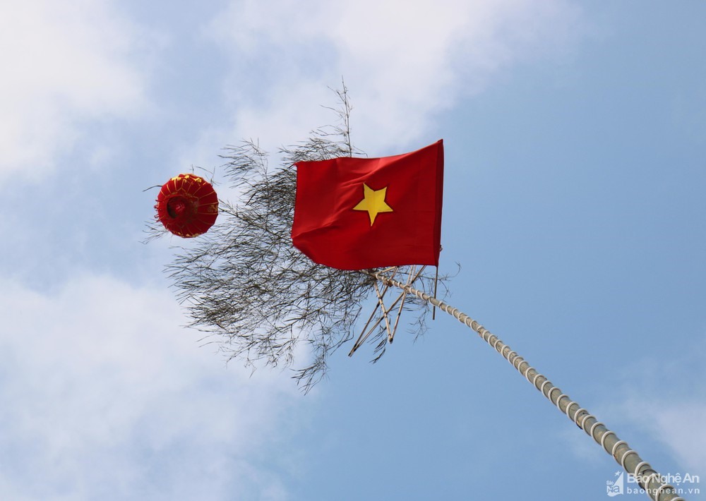 Cây nêu - một biểu tượng của văn hóa Việt. Ảnh tư liệu: Huy Thư