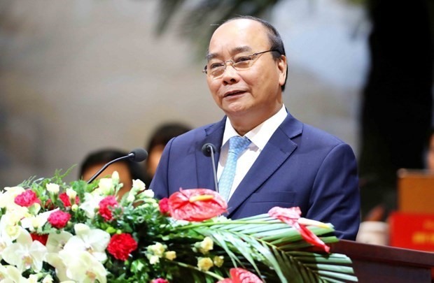 Chủ tịch Nước Nguyễn Xuân Phúc trình danh sách đề cử nhân sự để Quốc hội bầu làm Thủ tướng. Ảnh: TTXVN