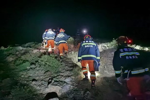 Lực lượng cứu hộ tìm kiếm người mất tích. (Nguồn: news.cgtn.com)