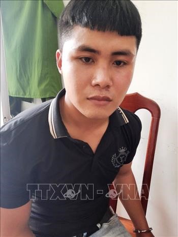 Đối tượng Nguyễn Minh Trường bị bắt giữ. Ảnh: Lê Đức Hoảnh/TTXVN