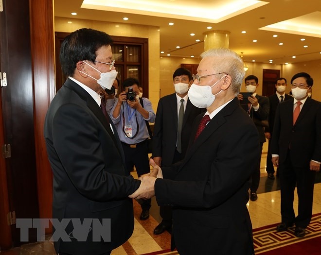 Tổng Bí thư Nguyễn Phú Trọng đón Tổng Bí thư, Chủ tịch nước Lào Thongloun Sisoulith. (Ảnh: Trí Dũng/TTXVN)