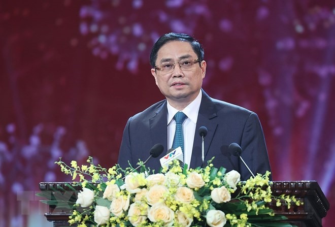 Thủ tướng Phạm Minh Chính và các đại biểu dự Lễ ra mắt Qũy vaccine phòng COVID-19. (Ảnh: Dương Giang/TTXVN)