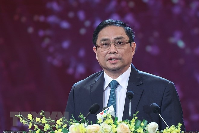 Thủ tướng Phạm Minh Chính và các đại biểu dự Lễ ra mắt Qũy vaccine phòng COVID-19. (Ảnh: Dương Giang/TTXVN)