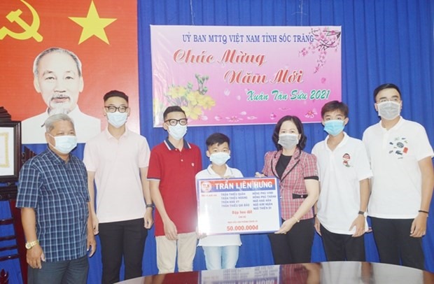 9 anh em trong một gia đình đập lợn để quyên góp 50 triệu đồng ủng hộ Quỹ vaccine phòng, chống COVID-19. (Nguồn: cand.com.vn)