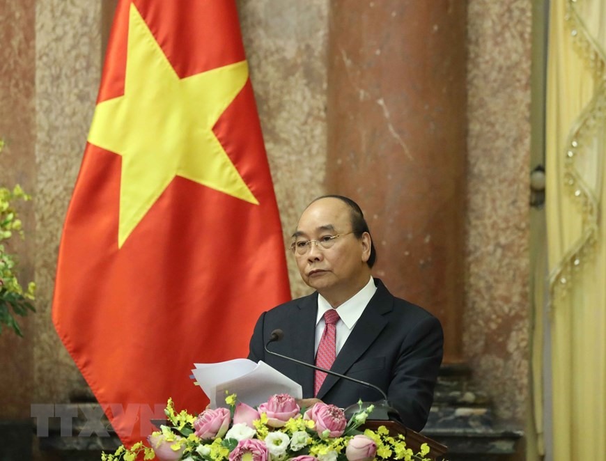 Chủ tịch nước Nguyễn Xuân Phúc phát biểu tại buổi trao quyết định thăng quân hàm Đại tướng cho Bộ trưởng Quốc phòng Phan Văn Giang. (Ảnh: Thống Nhất/TTXVN)
