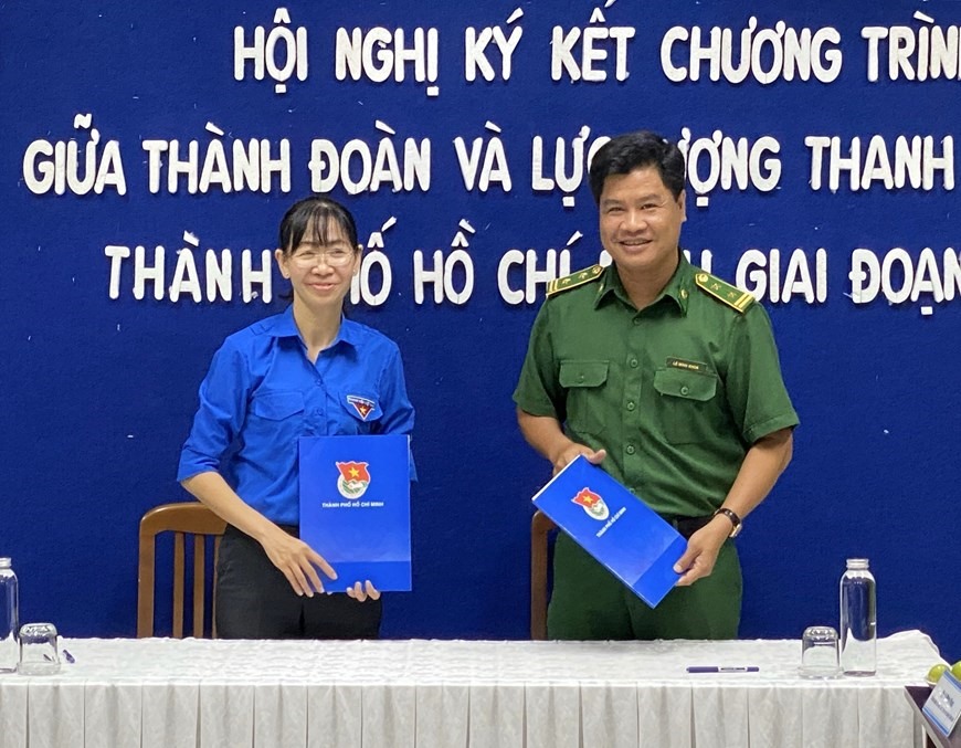 Ký kết Chương trình phối hợp giữa Thành đoàn và Lực lượng Thanh niên xung phong Thành phố Hồ Chí Minh giai đoạn 2020-2022, ngày 4/6/2020. (Ảnh: Hồng Giang/TTXVN)
