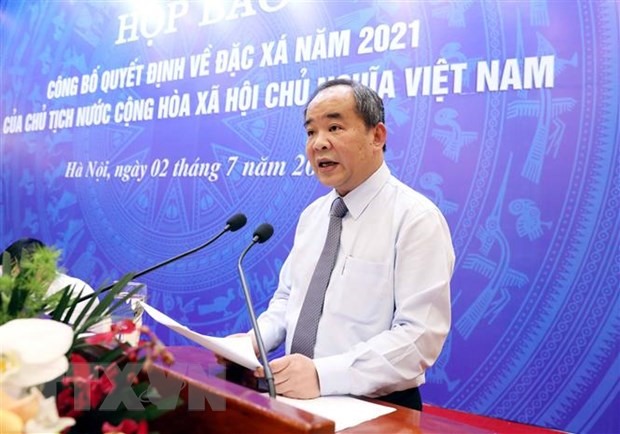 Ông Lê Khánh Hải, Ủy viên Trung ương Đảng, Bộ trưởng, Chủ nhiệm Văn phòng Chủ tịch nước, công bố Quyết định về đặc xá năm 2021 của Chủ tịch nước. (Ảnh: Phạm Kiên/TTXVN)