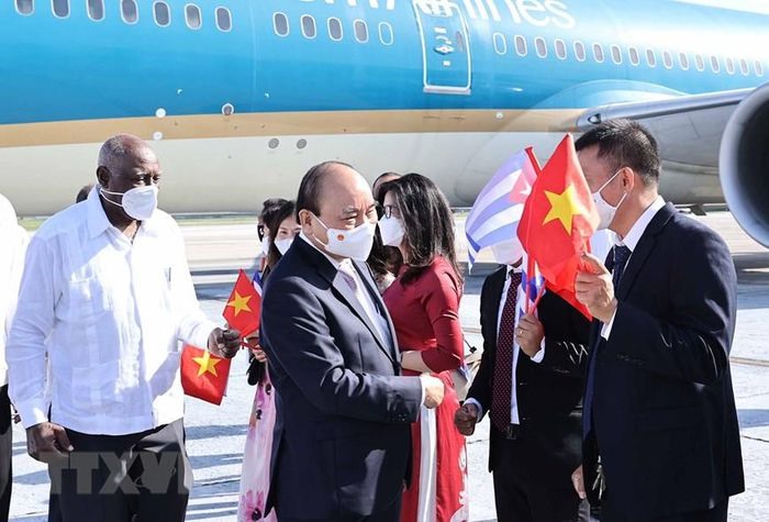 Chủ tịch nước Nguyễn Xuân Phúc tại sân bay. (Ảnh: Thống Nhất/TTXVN)