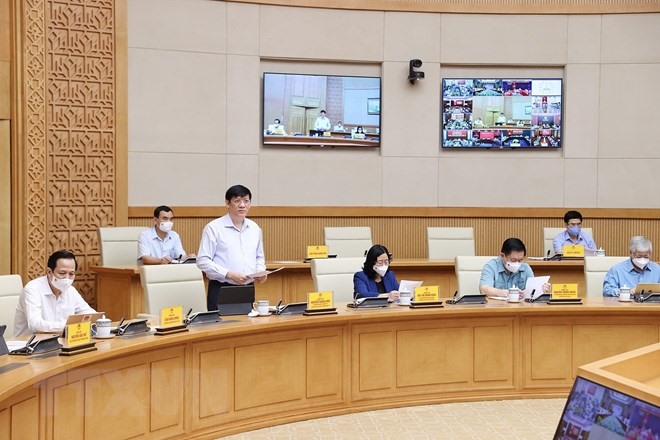 Thủ tướng Phạm Minh Chính chủ trì cuộc họp với các địa phương trên cả nước về công tác phòng, chống dịch COVID-19. (Ảnh: Dương Giang/TTXVN)