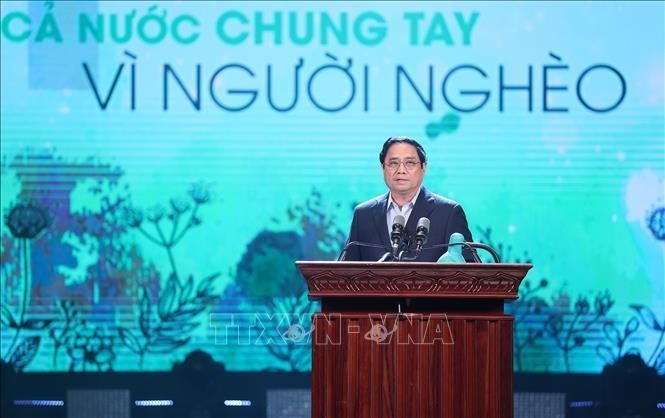 Thủ tướng Phạm Minh Chính phát biểu, vận động ủng hộ giúp đỡ người nghèo nhân Tháng cao điểm “Vì người nghèo” năm 2022. Ảnh: TTXVN.