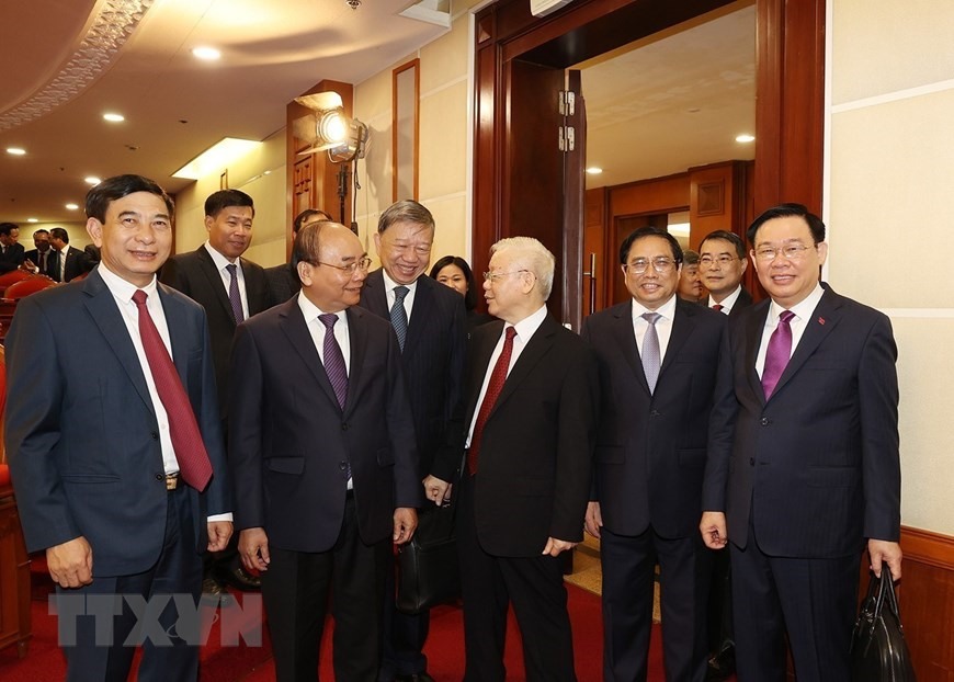 Tổng Bí thư Nguyễn Phú Trọng và các đồng chí lãnh đạo Đảng, Nhà nước với đại biểu dự khai mạc hội nghị. (Ảnh: Trí Dũng/TTXVN)