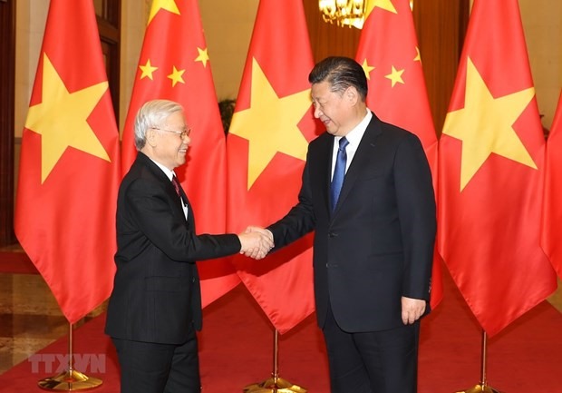 Tổng Bí thư, Chủ tịch nước Trung Quốc Tập Cận Bình đón Tổng Bí thư Nguyễn Phú Trọng trong chuyến thăm Trung Quốc hồi tháng 1/2017. (Ảnh: Trí Dũng/TTXVN)