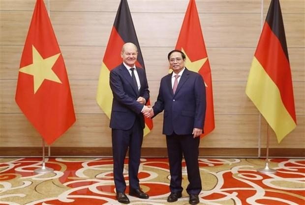 Thủ tướng Phạm Minh Chính và Thủ tướng Đức Olaf Scholz. (Ảnh: Lâm Khánh/TTXVN)