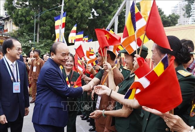 Chủ tịch nước Nguyễn Xuân Phúc với đại biểu dự đại hội. Ảnh: Thống Nhất/TTXVN