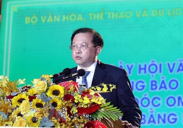 Thứ trưởng Bộ Văn hóa, Thể thao và Du lịch Tạ Quang Đông phát biểu khai mạc Ngày hội. (Ảnh: Trung Hiếu/TTXVN)