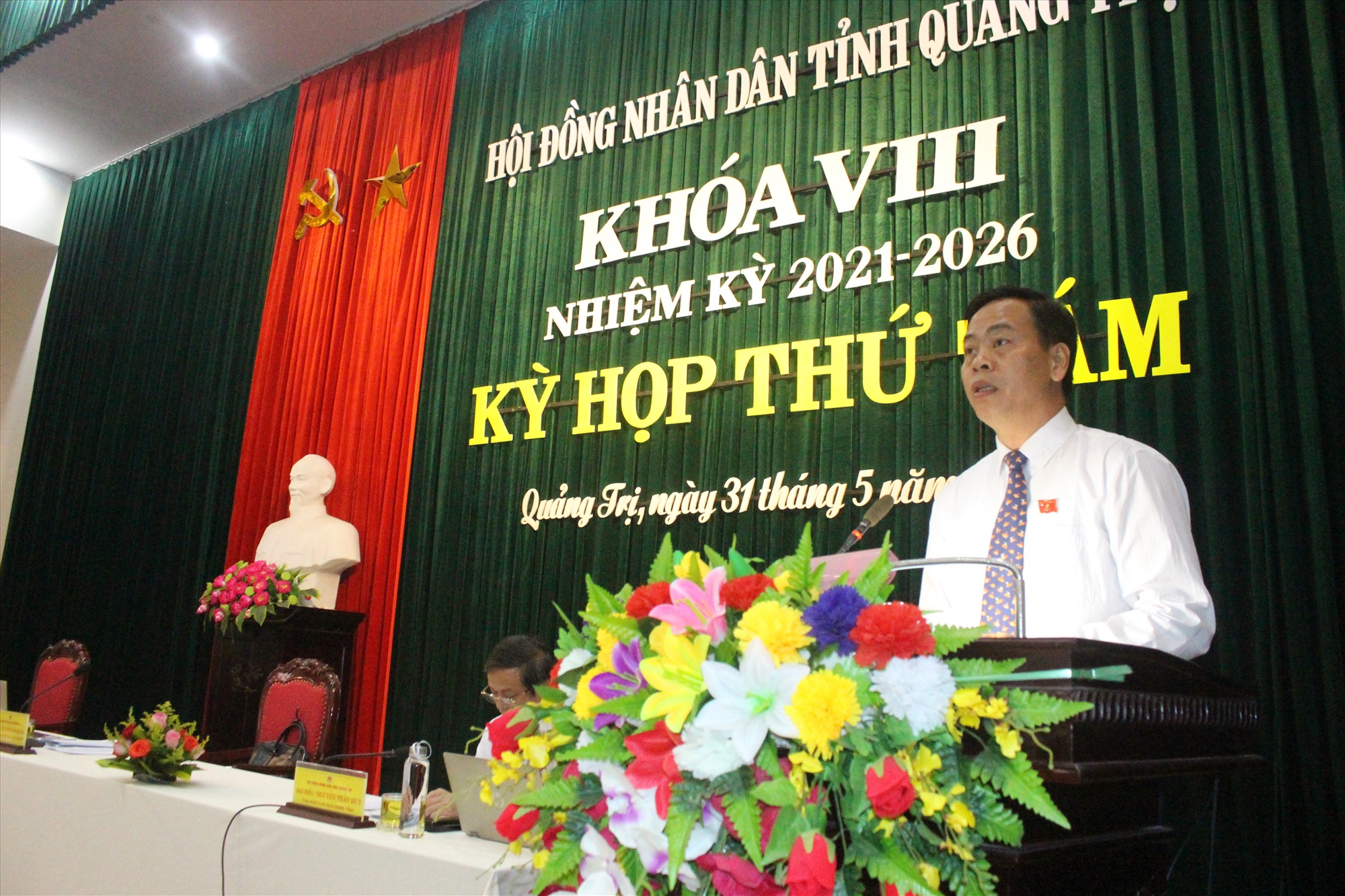 Phó Bí thư Thường trực Tỉnh ủy, Chủ tịch HĐND tỉnh Nguyễn Đăng Quang phát biểu khai mạc kỳ họp - Ảnh: T.T