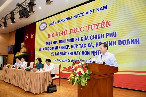 Phó Thủ tướng Lê Minh Khái phát biểu và chỉ đạo tại hội nghị trực tuyến triển khai Nghị định 31/2022/NĐ-CP của Chính phủ về hỗ trợ doanh nghiệp, hợp tác xã, hộ kinh doanh 2% lãi suất khi vay vốn ngân hàng thương mại. (Ảnh: CTV/Vietnam+)