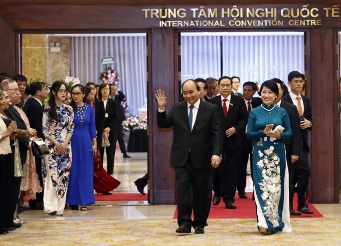 Chủ tịch nước Nguyễn Xuân Phúc và Phu nhân tới dự lễ kỷ niệm 77 năm Quốc khánh 2.9. Ảnh: TTXVN