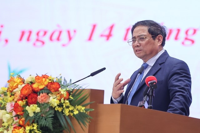 Thủ tướng Phạm Minh Chính phát biểu tại cuộc gặp kiều bào tham dự chương trình Xuân Quê hương 2023 nhân dịp Tết Nguyên đán Quý Mão - Ảnh: VGP/Nhật Bắc