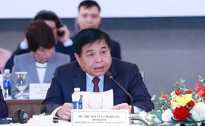 Bộ trưởng Bộ Kế hoạch và Đầu tư Nguyễn Chí Dũng khai mạc diễn đàn. (Ảnh: Dương Giang/TTXVN)