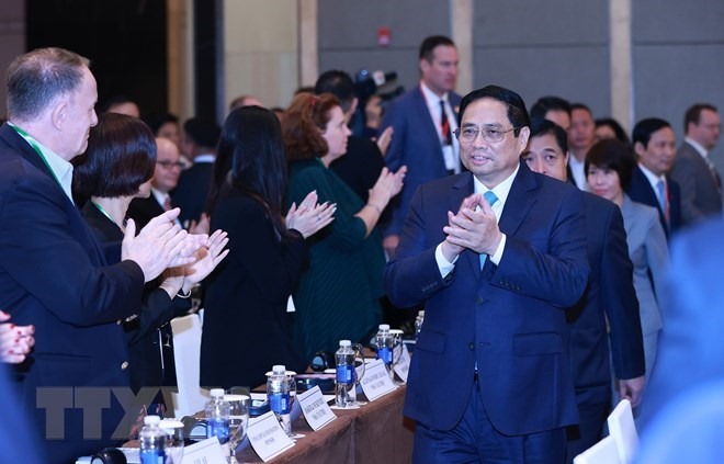 Thủ tướng Phạm Minh Chính đến dự Diễn đàn doanh nghiệp Việt Nam thường niên 2023. (Ảnh: Dương Giang/TTXVN)